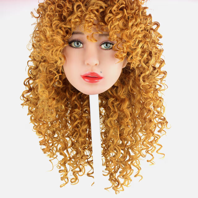 Vivian – Muñeca Realista de TPE con cabello pelirrojo y ojos verde.